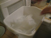 Here is the nylon straining bag in the sterilizer solution.